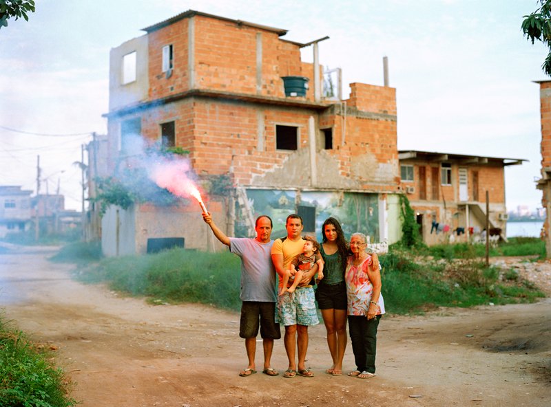 Bruno with his father and grandmother, his wife, and his son, Favela Vila Autódromo, Rio d