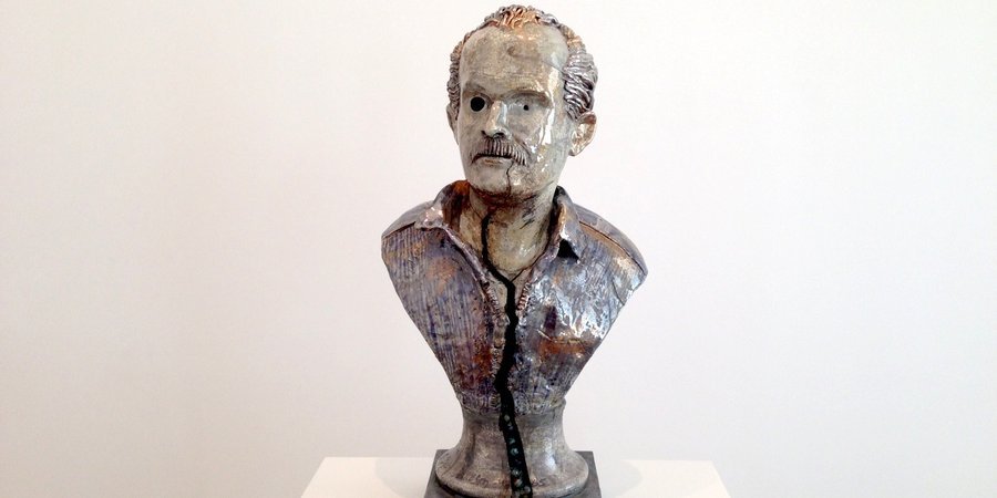 The marbles are leaking out the bottom of this cracked bust, a self-portrait of the artist, Robert Arneson, at David Zwirner.