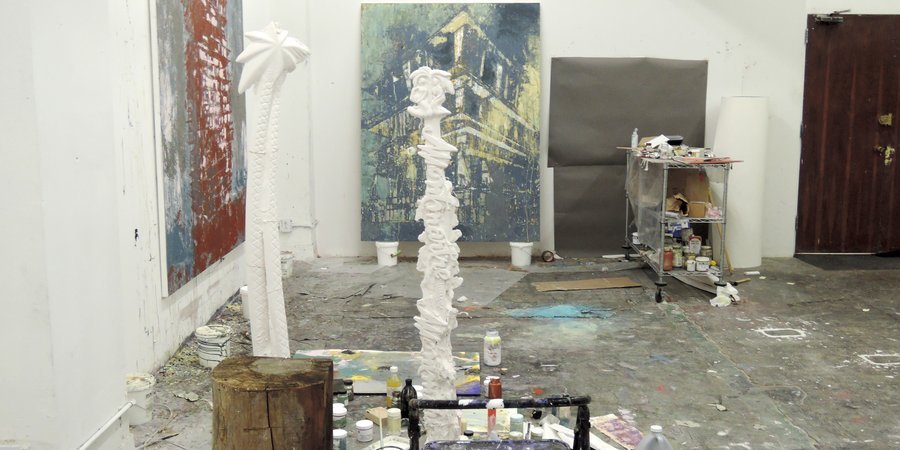 A view of the paintings and sculptures Perez currently has in the works at his studio.