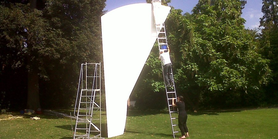 Beyeler Foundation art handlers maintain an Ellsworth Kelly sculpture on the grounds of the private museum.