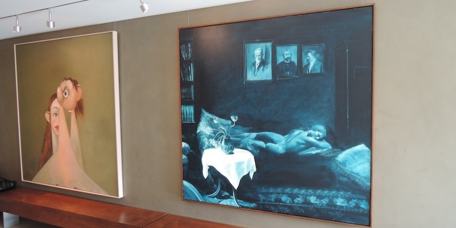 This Mark Tansey is a richly multilayered painting, executed entirely in a single shade of blue and showing a famous ancient sculpture of a hermaphrodite reclining on Anna Freud's psychoanalysis coach, with paintings of Freud, Marx, and Nietzsche above. 