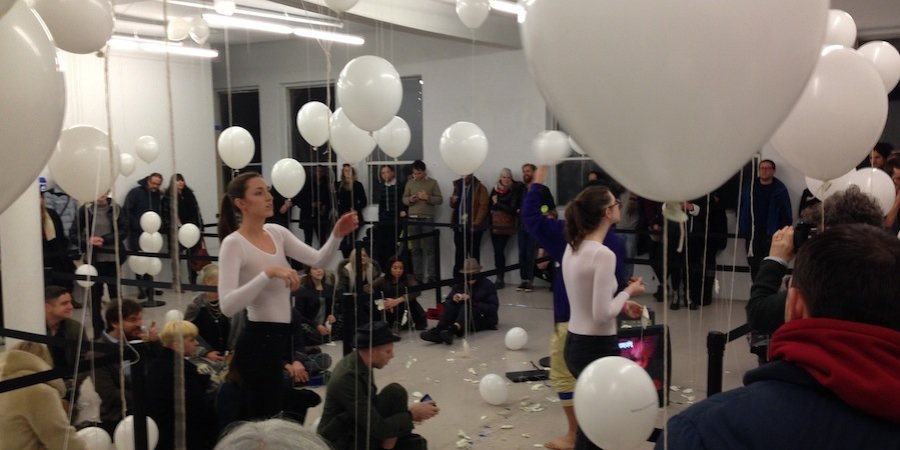 The end of the performance, with scissored balloon carcasses strewn everywhere