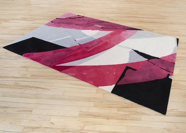 rugs are based on paper collages that are overlaid with gouache and ink and the translated into weaving