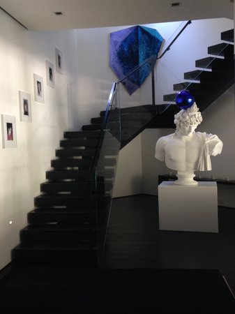 A view of the lower staircase, with Jeff Koons's Gazing Ball (Antinous-Dionysus)