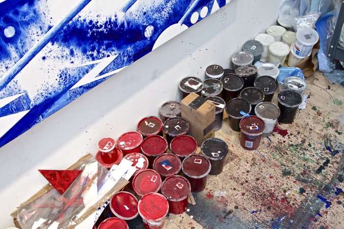 overhead shot of red paints