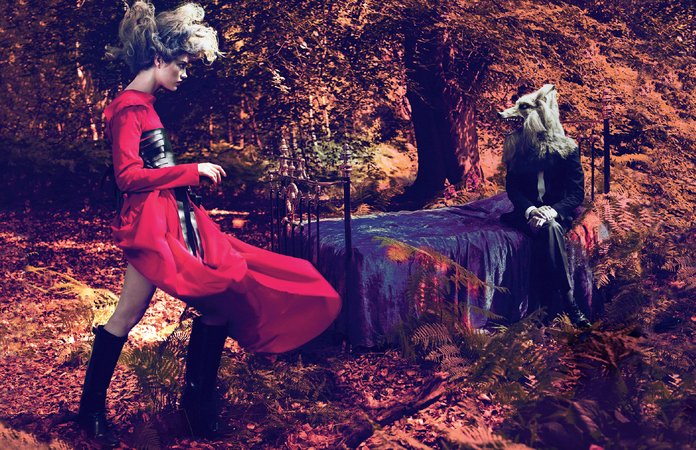 Mert Alas & Marcus Piggott, Natalia Vodianova in Ann Demeulemeester and wolf in Tom Ford. United Kingdom, September 2009