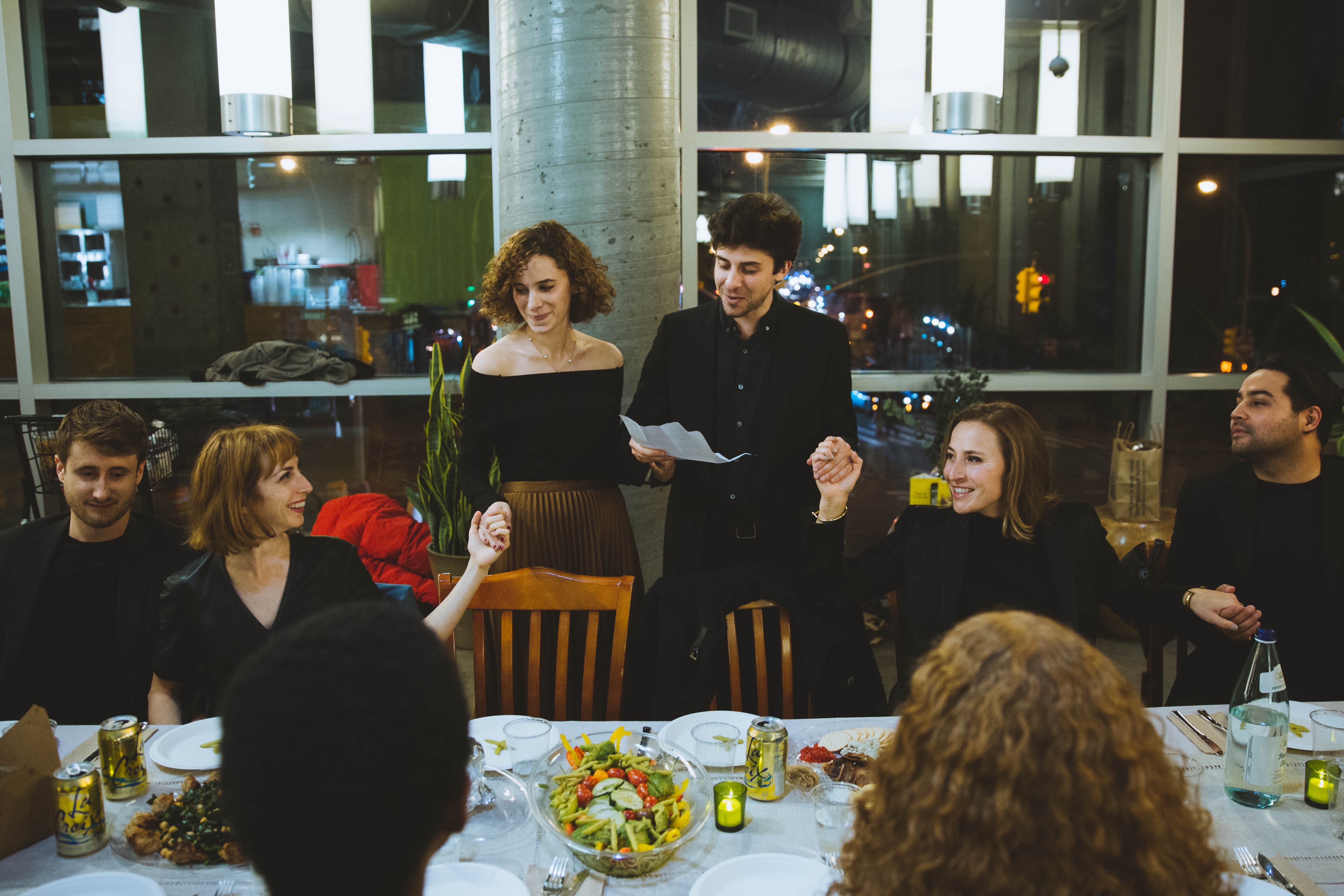 Ellie and Matt hosting a Wholesome Dinner. Photo courtesy of artist.