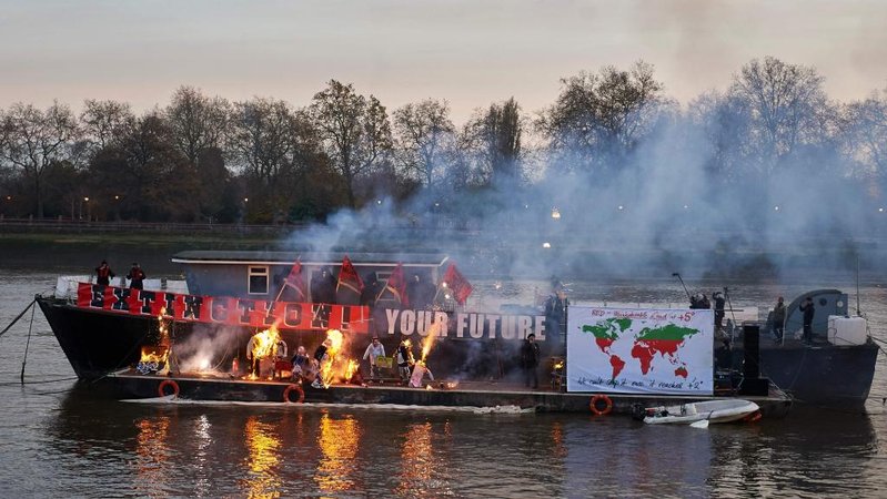 Joe Corre burns punk memorobilia on the River Thames, Image courtesy of The Daily
