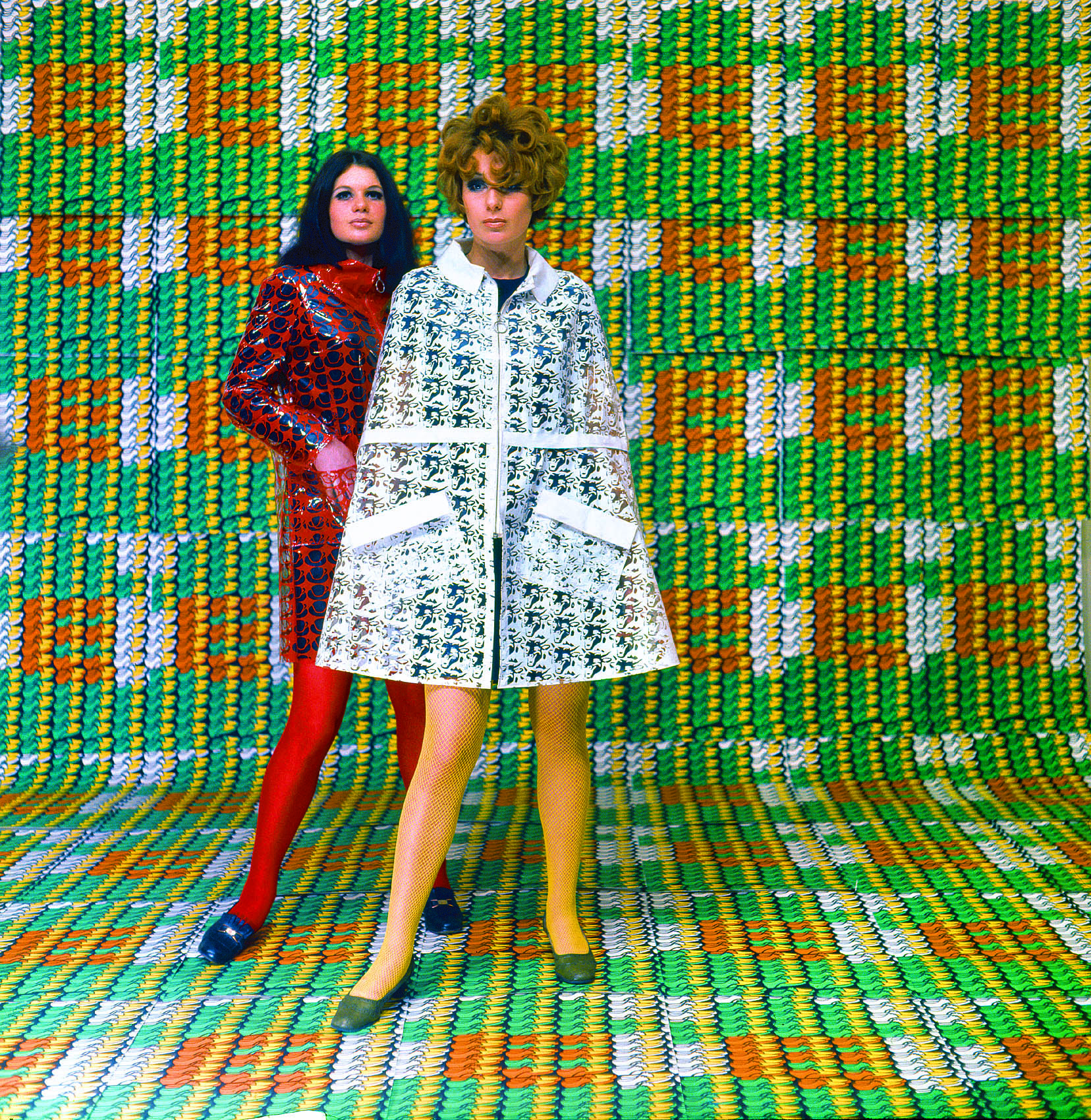 Models wearing coats designed by Lukowski + Ohanian with textile pattern by Thomas Bayrle,