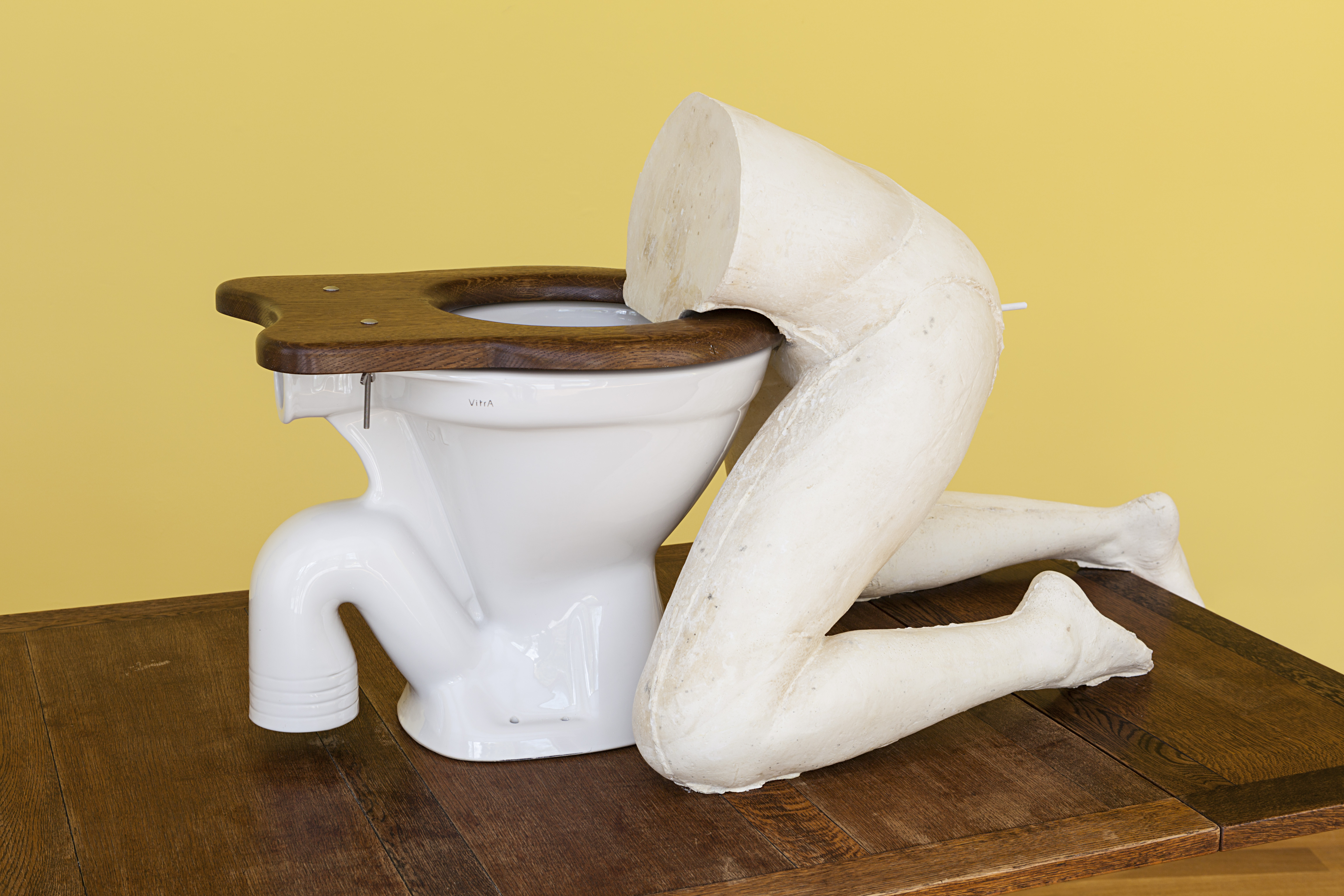 Sarah Lucas, Edith, 2015. Plaster, cigarette, toilet, and table, 54 3/4 x 73 5/8 x 38 3/4 