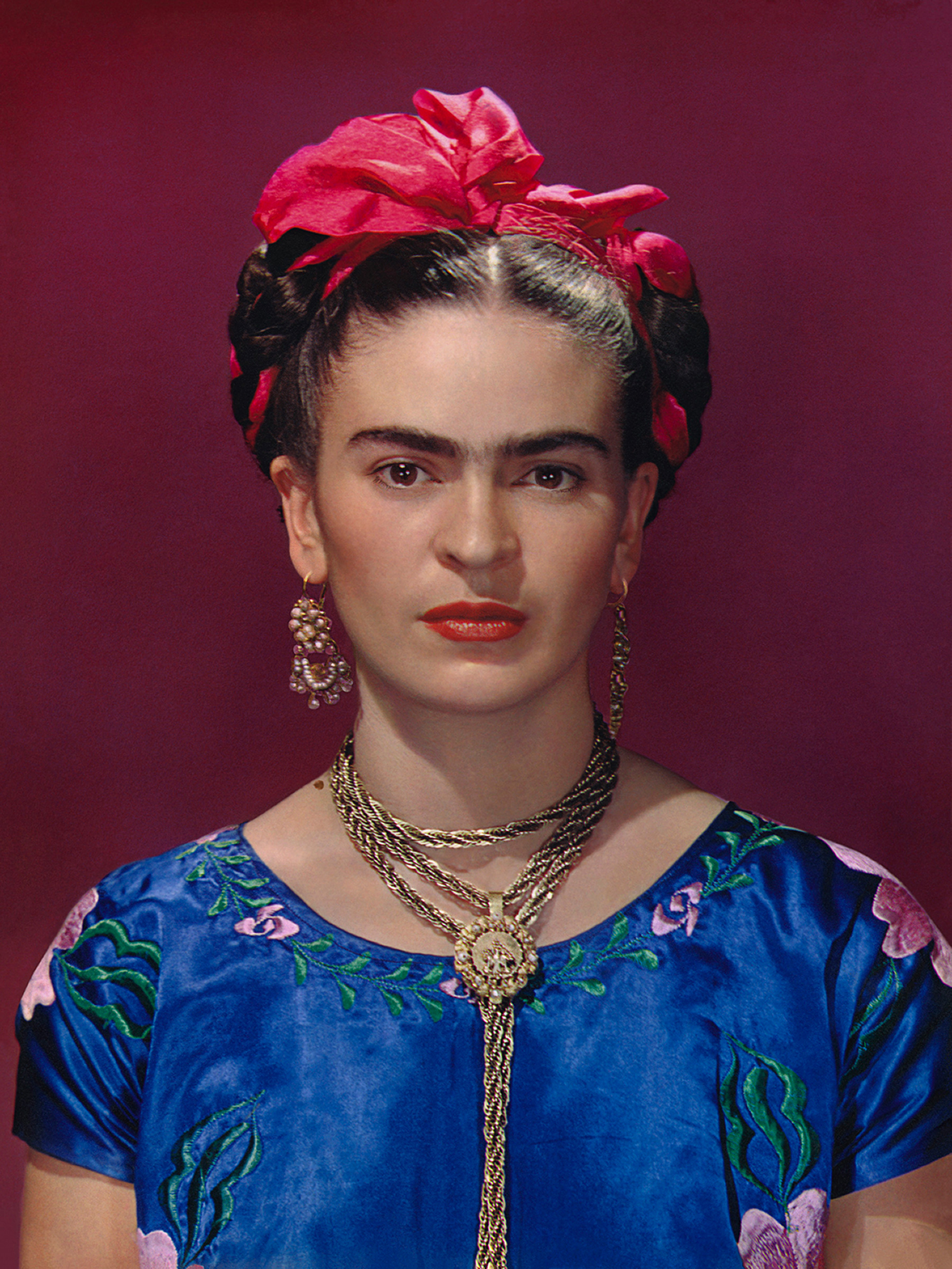 Frida Kahlo in blue satin blouse, 1939, photographby Nickolas Muray © Nickolas Muray Photo Archives