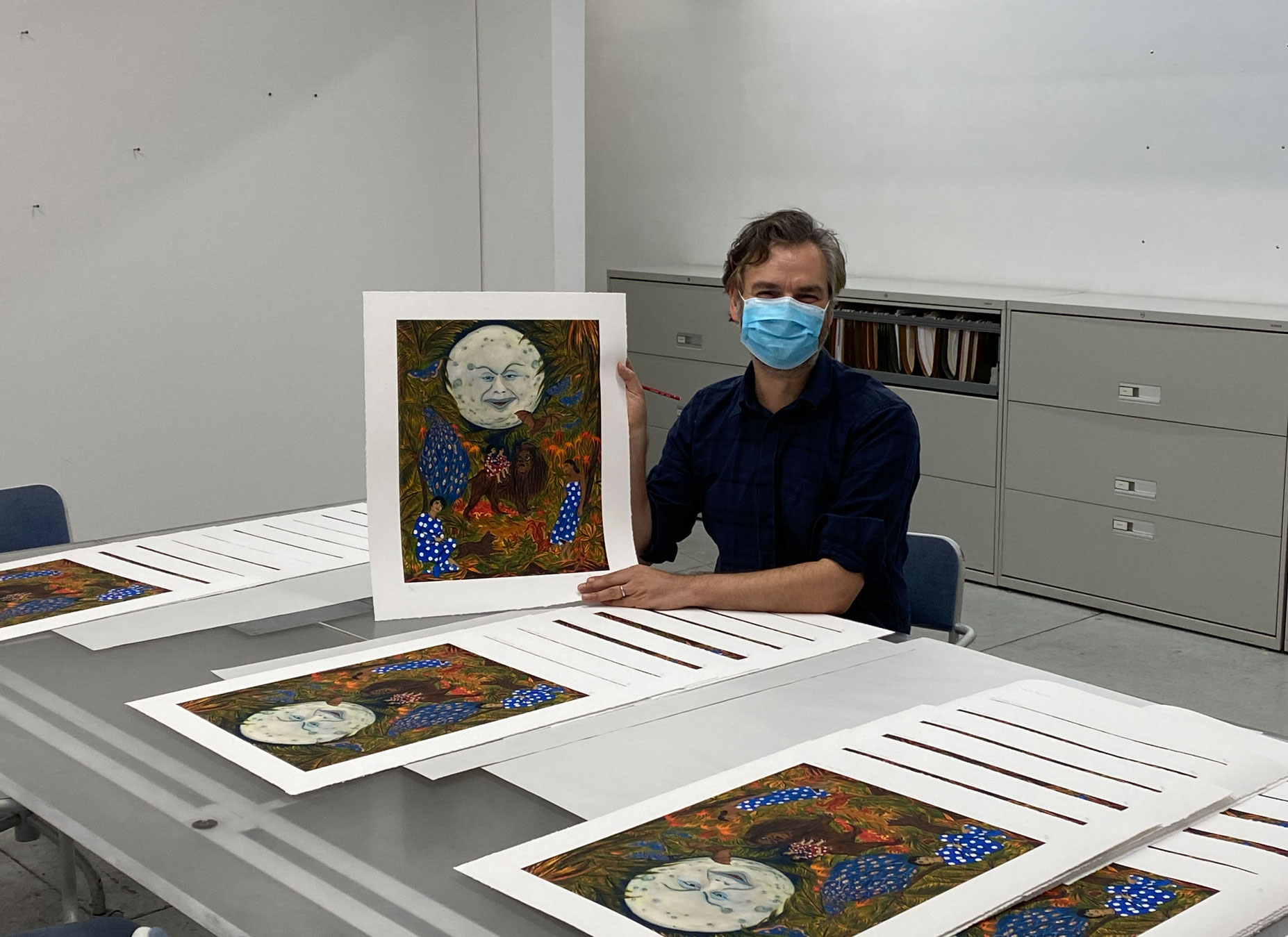 Marcel Dzama with his Artspace edition, The Illumination of the sisters of paradise,