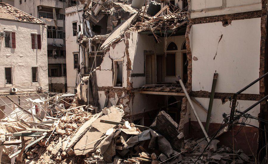 Collapsed building in the streets close to Tarek Moukaddem's Beirut apartment