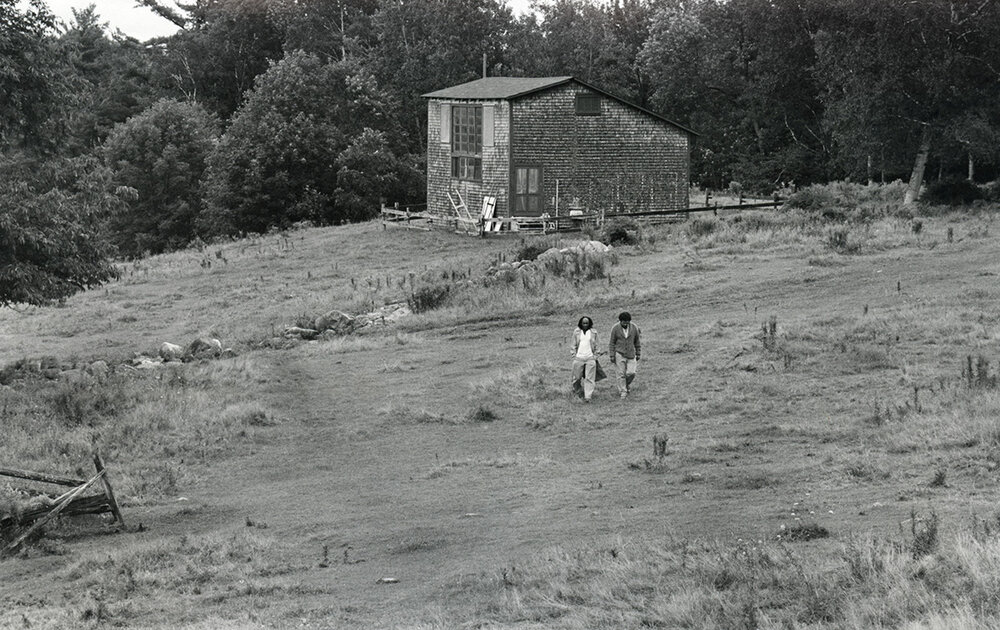 Participants walking down the cow fields with Cummings Studio in the background, 1991. Ima