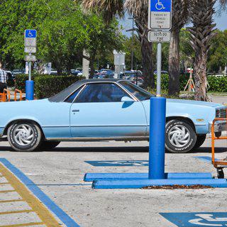 Dennis Church, Blue Truck in Parking Lot, Florida USA