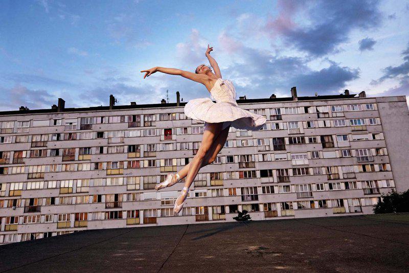 Arched throw, Montfermeil, France, (2014), by JR