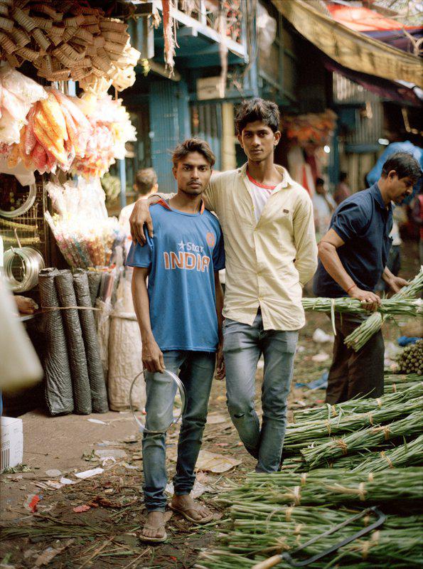 view:37811 - Marc Ohrem-Leclef, Saddam and his bother Najir worked side by side in the Flower Market. West Bengal - 