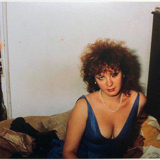 Nan Goldin, Self-portrait in Blue Dress, New York City, 1985