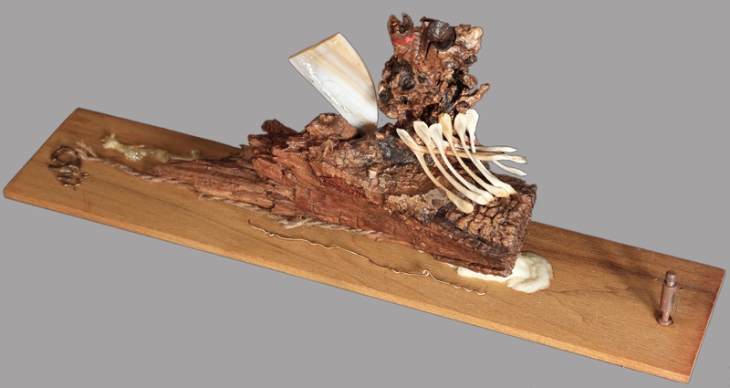 picture of the exhibition location Sail Away Mixed Media including wood, bones, glass, bronze spill, twine, wire, metal, gorilla glue 6" x 16" x 3.5" 2011.retail price:$620