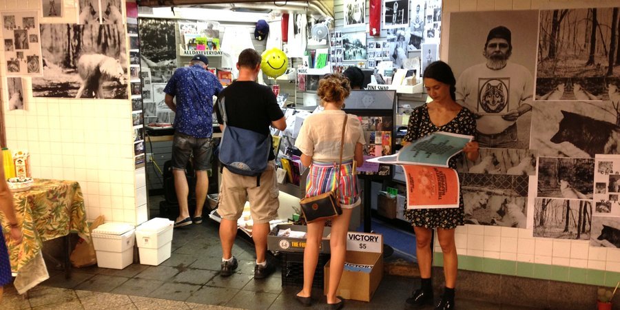The ALLDAYEVERYDAY art-book popup shop in the Lorimer Street L train station.