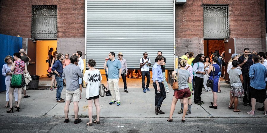 The crowd outside of SculptureCenter's after-hours reception for "Better Homes."