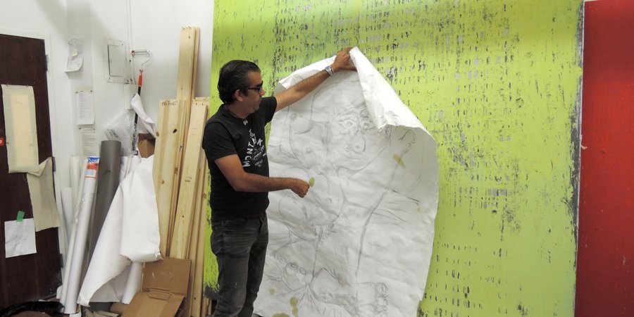 Perez and one of his Picasso-inspired drawings at his Midtown studio.