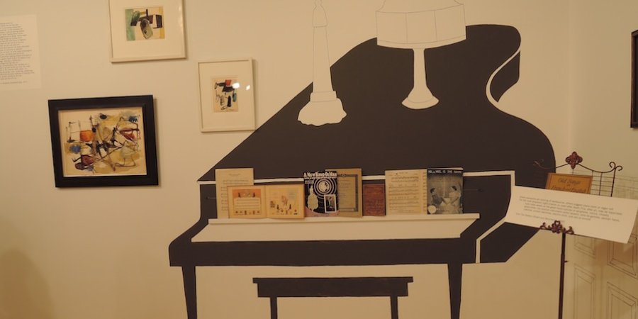 In the show "John Ashbery Collects" at Loretta Howard Gallery, items from the famed poet's personal collection are displayed in a setting made to approximate their actual display in Ashbery's home.