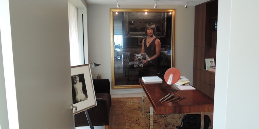 In this office, Man Ray's iconic photograph <em>Le Violin d'Ingres</em> is joined by a much larger photo from Cindy Sherman's 2008 "Society Portraits" series.