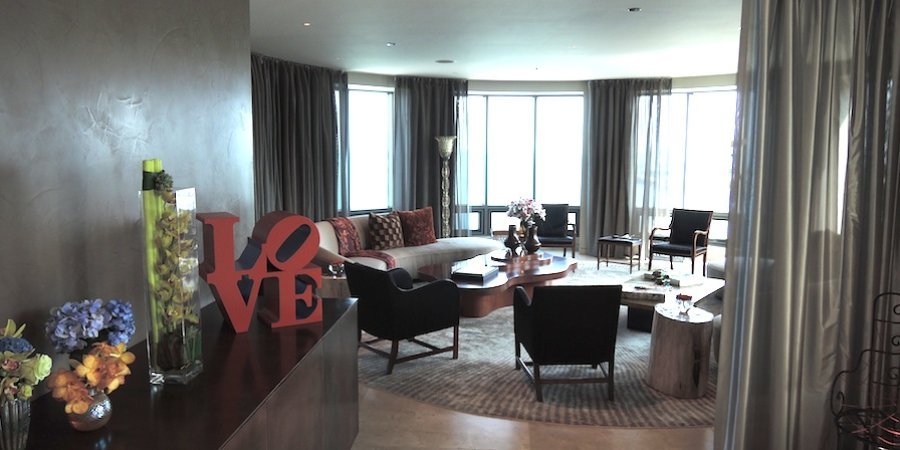 A Robert Indiana <EM>LOVE</em> sculpture welcomes guests into the living room.