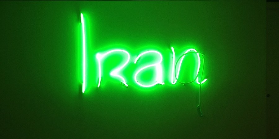 Bilal's neon morphing from "Iraq" to "Iran"