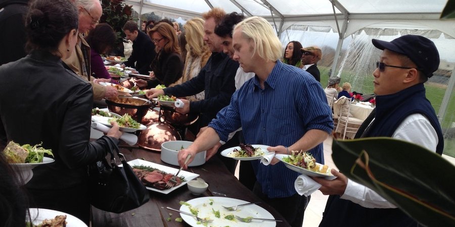 Guests raid the buffet at the Brant Foundation's opening for Julian Schnabel