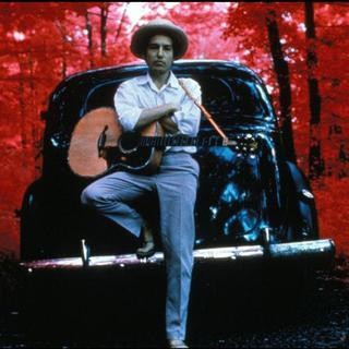 Elliott Landy, Bob Dylan, outside his Byrdcliffe home, infrared color film, Woodstock, NY, 1968. 
