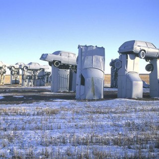 USA. Alliance, Nebraska. 1991. Jim Reindors, a sculptor, was so inspired by Stonehenge in England that he and his relatives built their own "Carhenge" during a family reunion in Alliance in 1987. art for sale