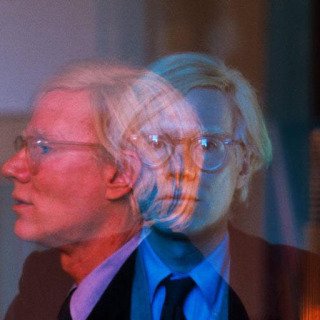 Thomas Hoepker, New York City. Manhattan. 1981. Double exposure of Andy Warhol in his "Factory" at Union Square.