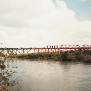 Victoria Sambunaris, Untitled, (Trains crossing the Rio Grande) Laredo, Texas
